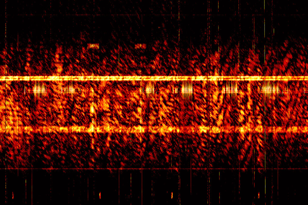 Spectograph of a covert communications radio broadcast (numbers station)